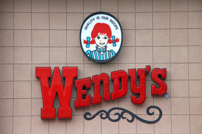 Oakland,,Ca,-,December,06,,2016:,Wendy's,Fast,Food,Restaurant Wendy's restaurant sign on exterior wall
