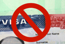 US visa with prohibition symbol overlay