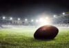 VIDEO: Touchdown, Then Deadly Silence Football on field in illuminated stadium at night.