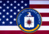 CIA emblem over United States flag background.