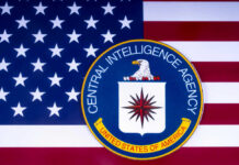 CIA Boss Issues Alarming Warning CIA emblem over United States flag background.