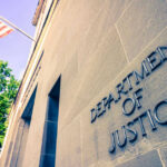 DOJ Targets Grocery Giants Because of THIS?! Department of Justice building with American flag.
