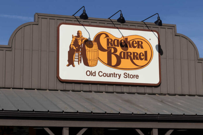 Indianapolis,-,Circa,December,2020:,Cracker,Barrel,Old,Country,Store Sign for Cracker Barrel Old Country Store featuring a man sitting on a barrel