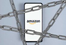 Amazon Grounds Partner After Deadly Incident Smartphone with e-commerce logo wrapped in metal chains