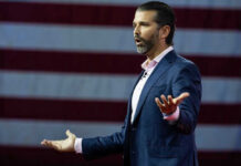 Russian Money Fuels Trump Jr. Wedding Bash Donald Trump Jr. speaking, American flag.