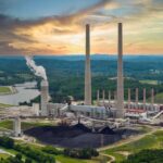 VIDEO: Deadly Chemical Tank Disaster Coal-fired power plant with tall smokestacks at sunset