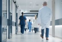 Hospital Horror For Army Veteran Revealed Medical staff walking through a hospital corridor