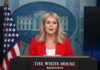 Woman speaking at a White House press briefing podium