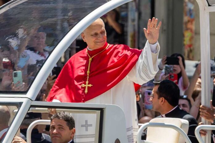 Madrid,,Spain,-,June,6,,2026:,Pope,Leo,Xiv,Visits Catholic clergyman in red vestments waving from a popemobile