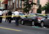 Platform Fight Ends in One Shot Police and crime scene tape on city street.
