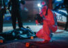 Surf Trip Turns Deadly – Chilling Verdict Forensic investigator examines crime scene at night.