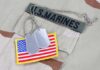 US Marines uniform with dog tags and American flag patch
