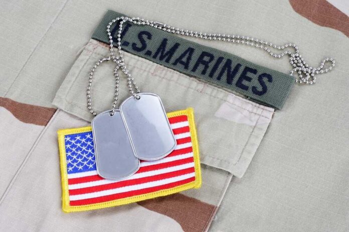 Us,Marines,Branch,Tape,With,Dog,Tags,And,Flag,Patch US Marines uniform with dog tags and American flag patch