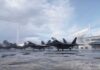 Seventh Terror Bust Near US Airbase Stealth fighter jets parked on a wet airbase apron