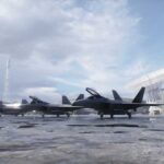Stealth fighter jets parked on a wet airbase apron