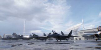 Stealth fighter jets parked on a wet airbase apron