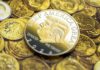 Treasury Trolls ‘Liberal’ Cafes With Trump Coin Gold coin featuring a profile of a political figure with the slogan 'Keep America Great'