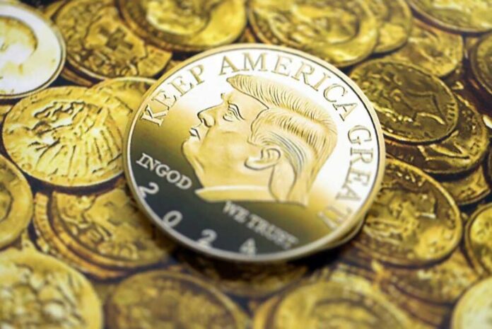 Kyiv,,Ukraine,-,December,13,,2025,Trump,Gold,Coin,On Gold coin featuring a profile of a political figure with the slogan 'Keep America Great'