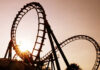 Coaster Horror Triggers Nationwide Shutdowns Roller coaster loops at sunset